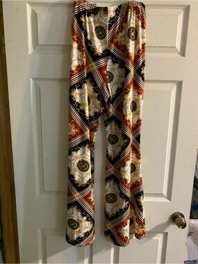 eye candy Printed Wide-Leg Pants in Rust, Black & Cream